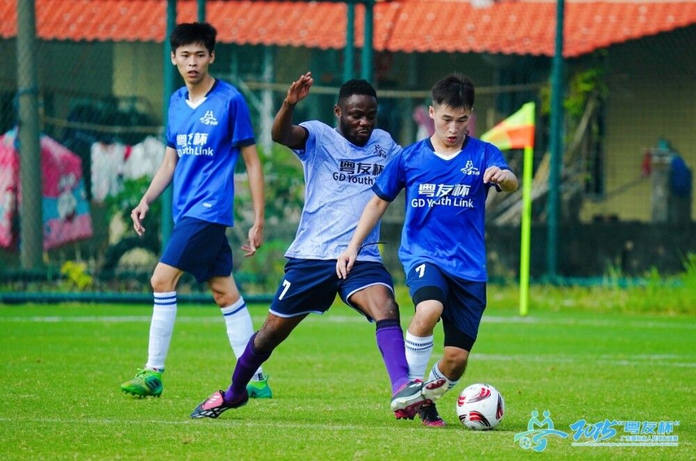 Young athletes compete in a friendly football match.